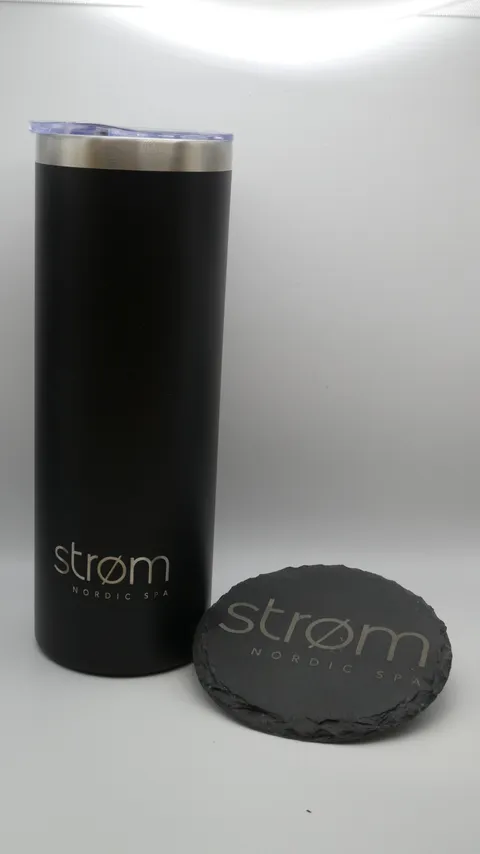 Custom branded spa gift set including laser engraved metal tumbler and natural slate coaster.