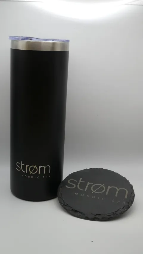 Custom branded spa gift set including laser engraved metal tumbler and natural slate coaster.