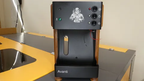 Laser engraved black metal appliance chassis with custom gorilla logo branding and Avanti text label on the base.